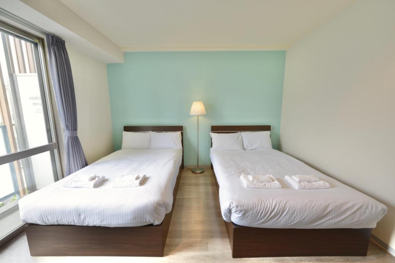 Hotel2020 Kuwanga Buitenkant foto